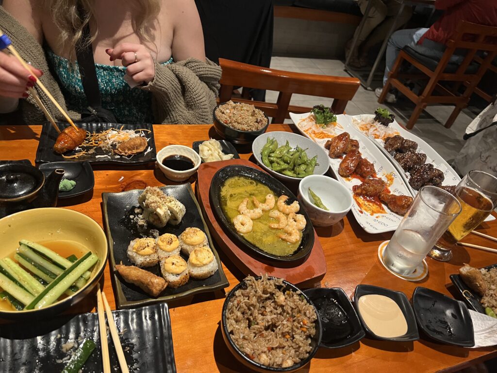 Lots of asian food on table